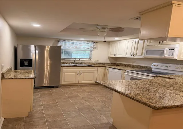 Photo 3 of Condo for sale at 4140 Passport Ln #101, New Port Richey, FL 34653 | MLS# W7883079 | Listing updated on 2026-09-26