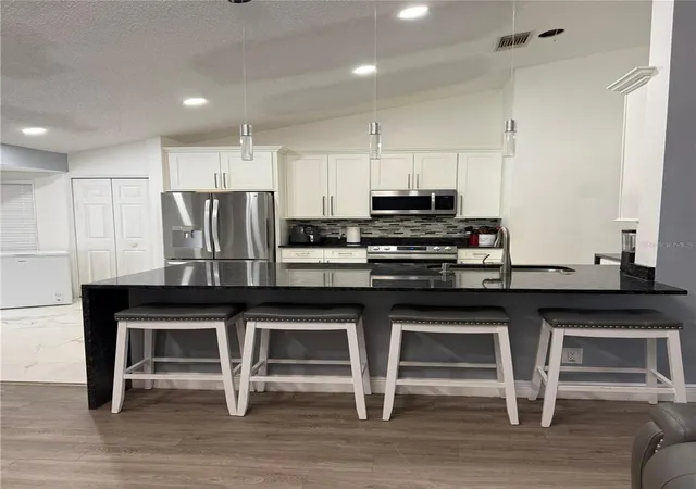 Photo 3 of Single family home for sale at 7736 Rollingridge Ct, Orlando, FL 32835 | MLS# S5144028 | Listing updated on 2026-08-07