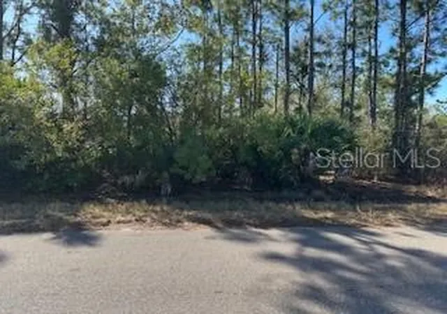 Photo 1 of Land for sale at 22143 Scarsdale Ave, Port Charlotte, FL 33954 | MLS# C7522152 | Listing updated on 2026-06-01