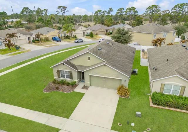 Photo 2 of Single family home for sale at 402 Pink Coral Ln, New Smyrna Beach, FL 32168 | MLS# NS1087398 | Listing updated on 2026-09-03