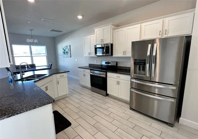 4th image of 36097 Welsh Glade Rd, Dade City, FL 33525 | MLS# TB8478095