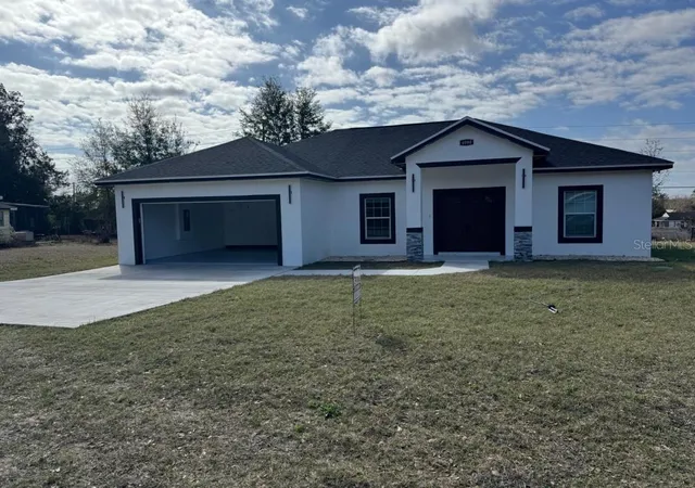 1st image of 4090 Se 134th Pl, Belleview, FL 34420 | MLS# A4683205