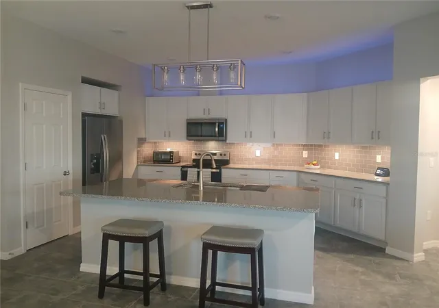 5th image of 9475 Oakleaf Hammock Pl, Seffner, FL 33584 | MLS# O6384203