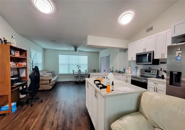 Photo 4 of Single family home for sale at 7051 Wentworth Way, New Port Richey, FL 34655 | MLS# TB8478731 | Listing updated on 2026-08-17