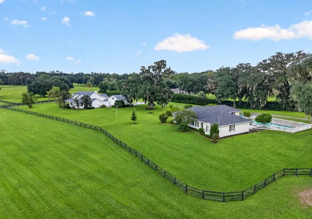 Photo 3 of Mansion for sale at 7137 S & 7141 Magnolia Ave, Ocala, FL 34476 | MLS# OM719407 | Listing updated on 2026-10-08