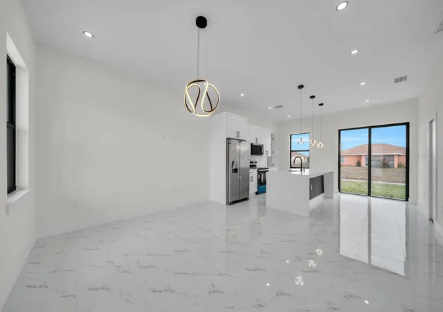 4th image of 4003 10Th St Sw, Lehigh Acres, FL 33976 | MLS# A4683621