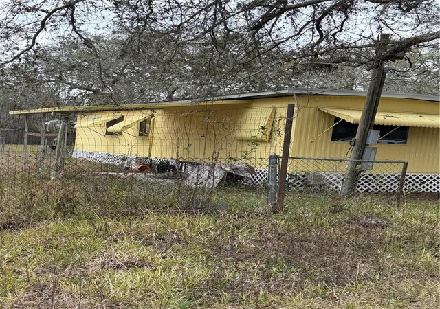 Photo 2 of Manufactured home for sale at 12013 Bethwood Ave, New Port Richey, FL 34654 | MLS# V4947536 | Listing updated on 2026-03-11