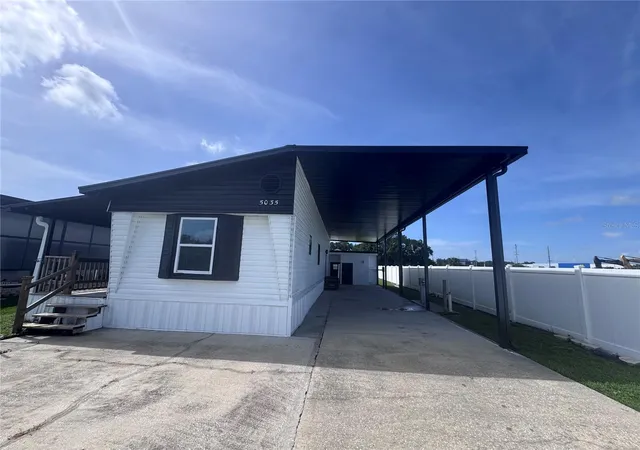 Photo 3 of Manufactured home for sale at 5035 Southshore Dr, Polk City, FL 33868 | MLS# S5144528 | Listing updated on 2026-09-17