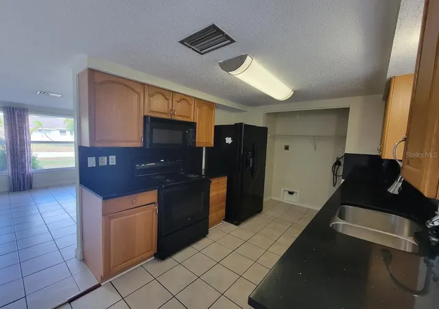 Photo 2 of Single family home for sale at 22353 Buffalo Ave, Port Charlotte, FL 33952 | MLS# A4683854 | Listing updated on 2026-05-05
