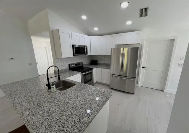3rd image of 12824 Dunhill Dr, Tampa, FL 33624 | MLS# TB8480462