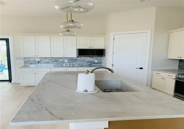 3rd image of 703 Boundary Blvd, Rotonda West, FL 33947 | MLS# D6146331