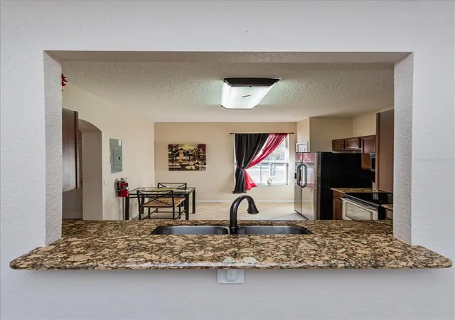 Photo 4 of Townhouse for sale at 232 La Mirage St, Davenport, FL 33897 | MLS# O6385997 | Listing updated on 2026-09-14