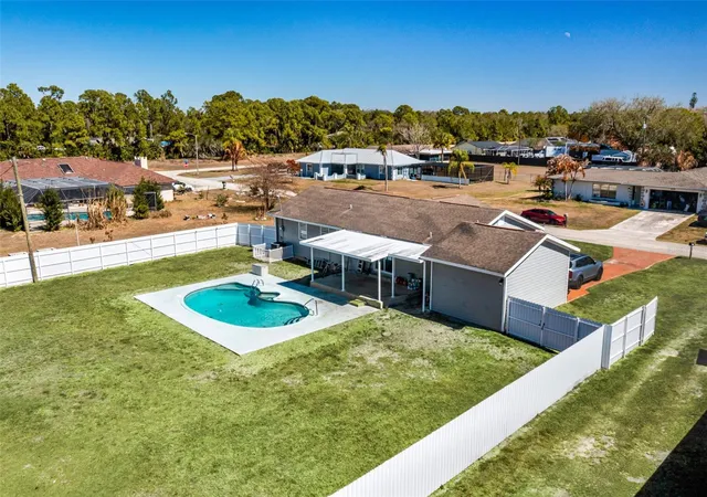 Photo 3 of Single family home for sale at 323 Greenwood Ave, Lehigh Acres, FL 33936 | MLS# O6386081 | Listing updated on 2026-04-27