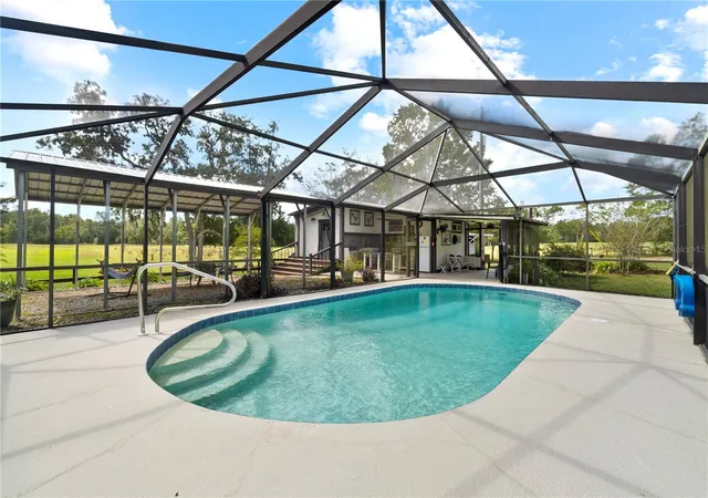 Photo 4 of House for sale at 7650 NE 40th Street, High Springs, FL 32643 | MLS# O6386085 | Listing updated on 2026-09-01