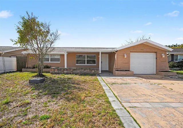 Photo 1 of Single family home for sale at 7214 Ingleside Dr, Port Richey, FL 34668 | MLS# O6386236 | Listing updated on 2026-08-21