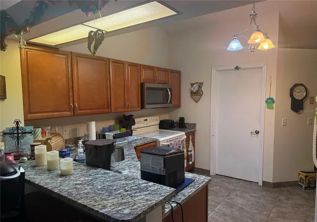Photo 3 of Townhouse for sale at 13143 Laver Ln, Orlando, FL 32824 | MLS# S5144791 | Listing updated on 2026-08-18