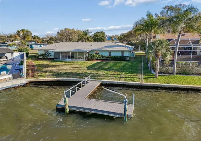 Photo 3 of Single family home for sale at 4415 Clearwater Harbor Dr N, Largo, FL 33770 | MLS# TB8481601 | Listing updated on 2026-09-27