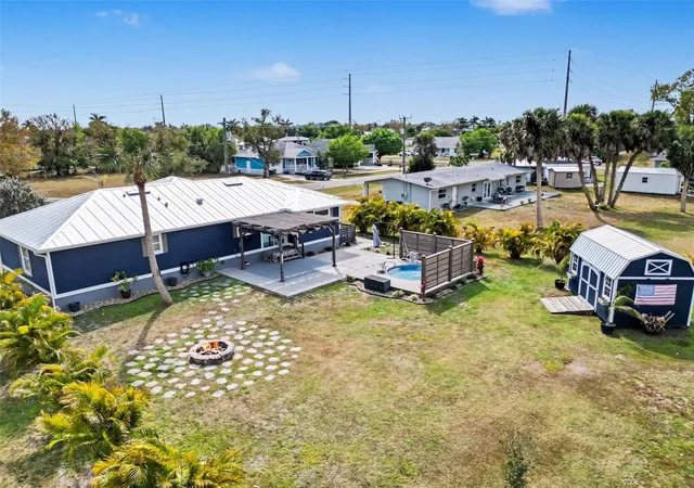 Photo 2 of Single family home for sale at 410 E Henry St, Punta Gorda, FL 33950 | MLS# C7522680 | Listing updated on 2026-09-29