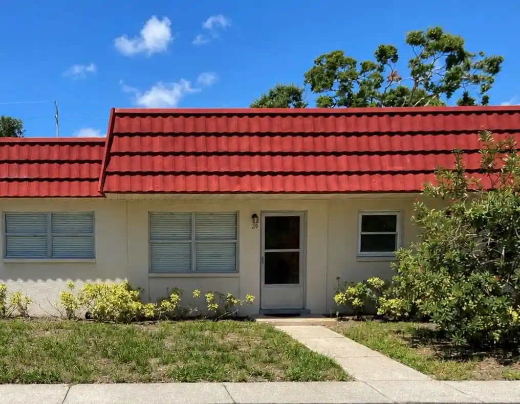 Listing Photo 1 - Condo for sale in 5860 38Th Ave N located at 5860 38Th Ave N, ST PETERSBURG, FL 33710 - Unit #29