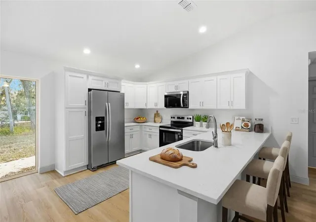 Photo 4 of Single family home for sale at 14095 SE 27th Court, Summerfield, FL 34491 | MLS# OM719901 | Listing updated on 2026-08-20