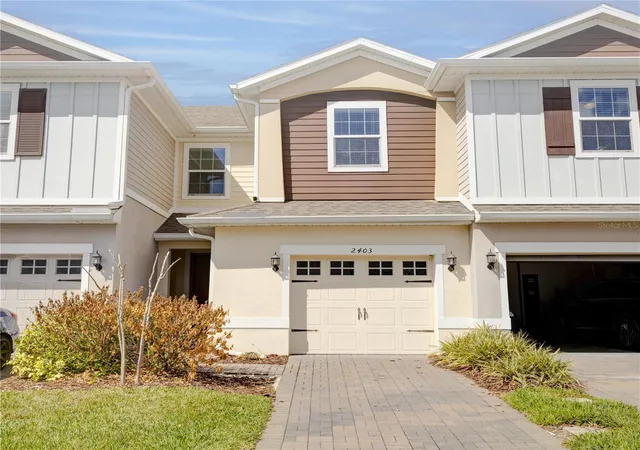 Photo 1 of Townhouse for sale at 2403 Sedge Grass Way, Orlando, FL 32824 | MLS# S5144991 | Listing updated on 2026-07-29