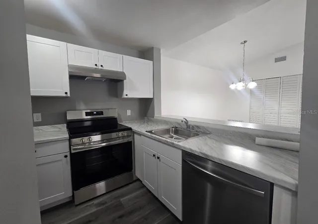 Listing Photo 4 - Condo for sale in building located at 5232 Via Hacienda Cir, ORLANDO, FL 32839 - Unit #A217