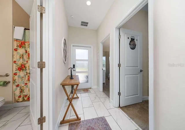 Photo 3 of Townhouse for sale at 8999 Cabot Cliffs Dr, Davenport, FL 33896 | MLS# O6387305 | Listing updated on 2026-08-17