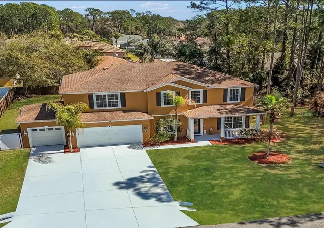 Photo 1 of Single family home for sale at 4 Lake Charles Pl, Palm Coast, FL 32137 | MLS# FC316619 | Listing updated on 2026-09-13