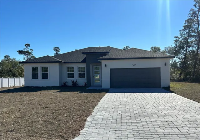 Photo 2 of Single family home for sale at 555 Marion Oaks Golf Rd, Ocala, FL 34473 | MLS# O6387445 | Listing updated on 2026-03-09