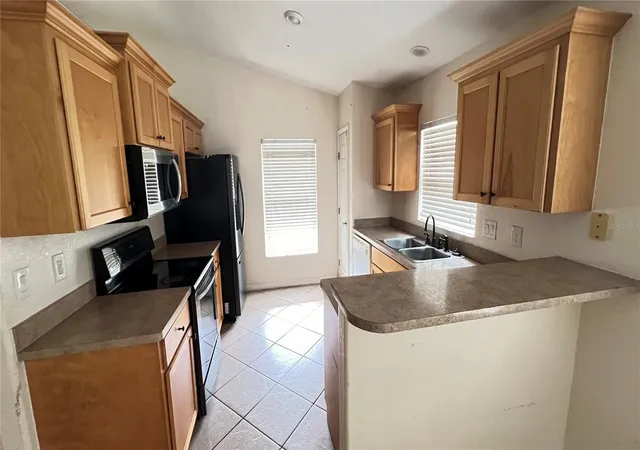 Photo 3 of Single family home for sale at 513 Lemon St, Auburndale, FL 33823 | MLS# O6387447 | Listing updated on 2026-06-22