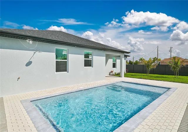 Photo 2 of Single family home for sale at 1326 Ne 7th Place, Cape Coral, FL 33909 | MLS# TB8482647 | Listing updated on 2026-09-13