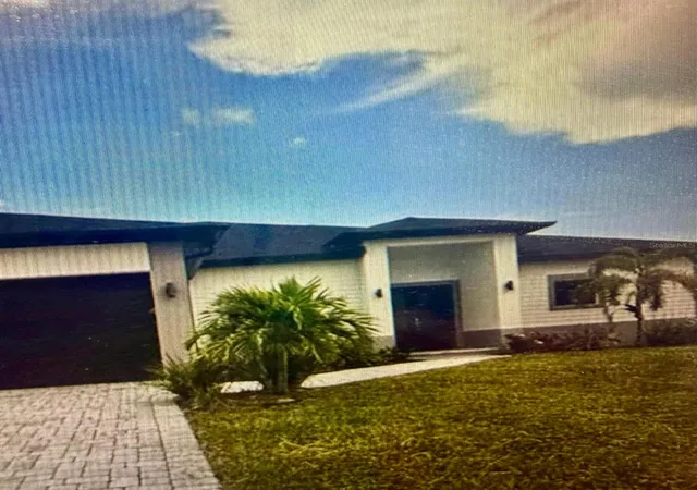 Photo 1 of Single family home for sale at 704 Mindora Ave, Lehigh Acres, FL 33972 | MLS# GC538155 | Listing updated on 2026-08-29