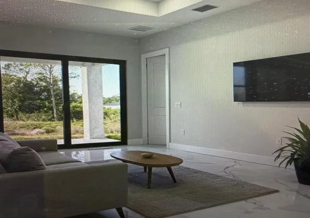 Photo 3 of Single family home for sale at 704 Mindora Ave, Lehigh Acres, FL 33972 | MLS# GC538155 | Listing updated on 2026-08-29