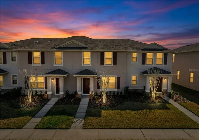 Photo 2 of Townhouse for sale at 1404 Dusty Stone Ln, Kindred, FL 34744 | MLS# O6387862 | Listing updated on 2026-06-26
