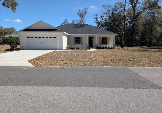 Photo 2 of Single family home for sale at 1303 Ne 23rd Avenue, Ocala, FL 34470 | MLS# OM720139 | Listing updated on 2026-09-03