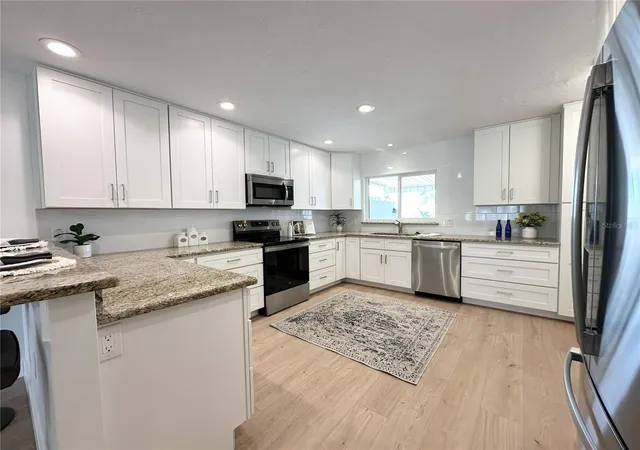Photo 4 of House for sale at 403 Boca Ciega Point Blvd N, Saint Petersburg, FL 33708 | MLS# TB8483693 | Listing updated on 2026-10-07