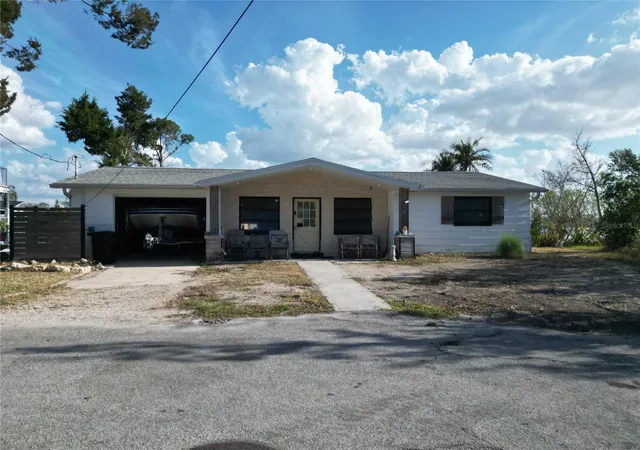 Photo 2 of Single family home for sale at 8402 Damen Ln, Port Richey, FL 34668 | MLS# W7883700 | Listing updated on 2026-08-27