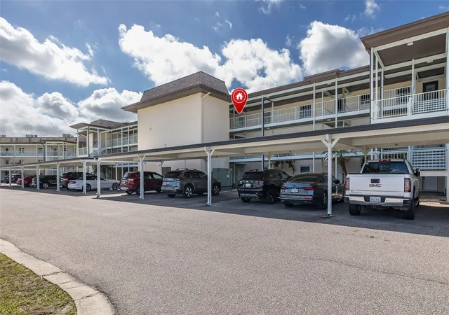 Photo 1 of Condo for sale at 4660 Marine Pkwy #303, New Port Richey, FL 34652 | MLS# W7883709 | Listing updated on 2026-10-11