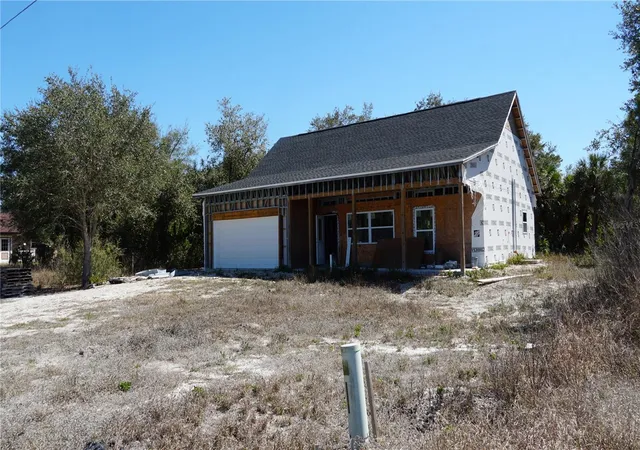Photo 1 of Single family home for sale at 98 Pelton Cir, Port Charlotte, FL 33954 | MLS# O6388877 | Listing updated on 2026-09-14