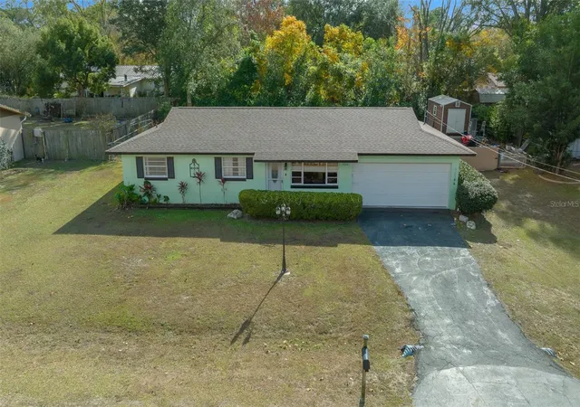 Photo 2 of Single family home for sale at 2004 Ne 52nd Street, Ocala, FL 34479 | MLS# OM720430 | Listing updated on 2026-03-10