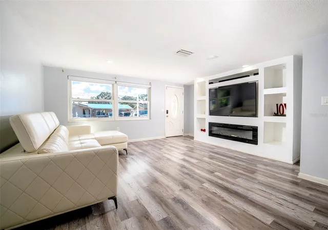 Photo 3 of Single family home for sale at 4301 Westwood Dr, Holiday, FL 34691 | MLS# TB8484815 | Listing updated on 2026-03-13