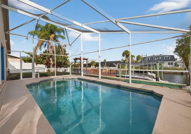 Photo 3 of Single family home for sale at 8711 Bay Crst Ln, Tampa, FL 33615 | MLS# TB8484861 | Listing updated on 2026-09-21