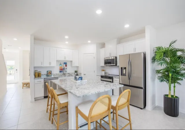 Photo 3 of Townhouse for sale at 10721 Fountain Palm Cir, Bokeelia, FL 33922 | MLS# O6389318 | Listing updated on 2026-09-24