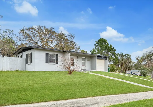 Photo 1 of Single family home for sale at 889 W Village Dr, Deltona, FL 32725 | MLS# O6389379 | Listing updated on 2026-08-24