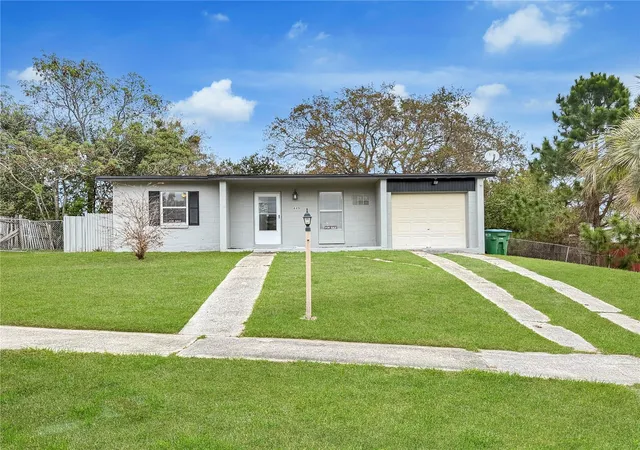 Photo 2 of Single family home for sale at 889 W Village Dr, Deltona, FL 32725 | MLS# O6389379 | Listing updated on 2026-08-24