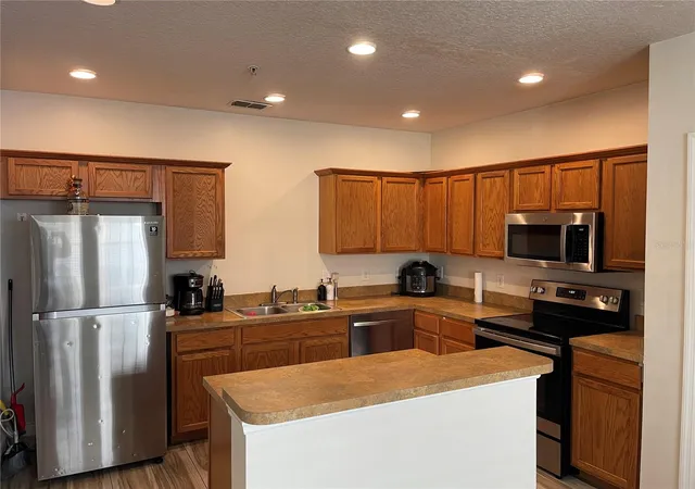 Photo 3 of Townhouse for sale at 2024 Cypress Bay Blvd, Kissimmee, FL 34743 | MLS# S5145498 | Listing updated on 2026-06-24