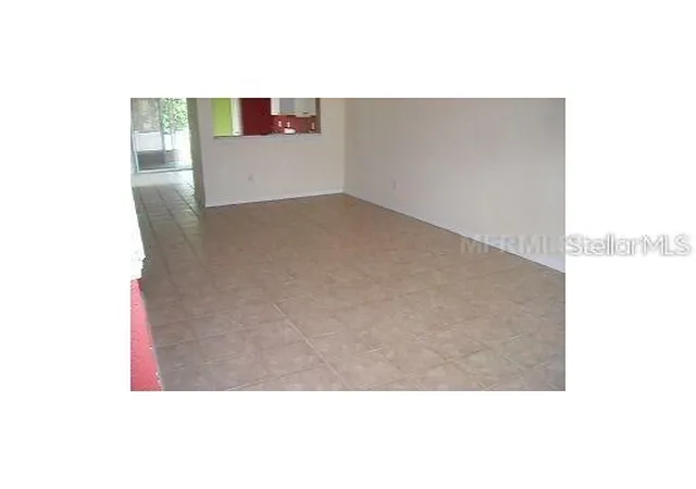 Photo 2 of Townhouse for sale at 4204 Plantation Cvs Dr, Orlando, FL 32810 | MLS# O6389416 | Listing updated on 2026-03-12