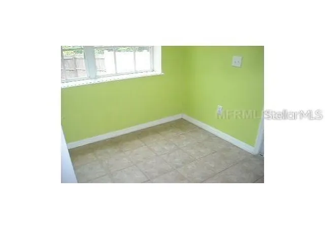 Photo 3 of Townhouse for sale at 4204 Plantation Cvs Dr, Orlando, FL 32810 | MLS# O6389416 | Listing updated on 2026-03-12