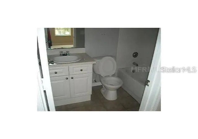 Photo 4 of Townhouse for sale at 4204 Plantation Cvs Dr, Orlando, FL 32810 | MLS# O6389416 | Listing updated on 2026-03-12