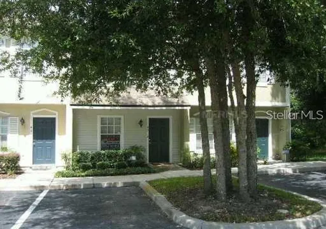 Photo 1 of Townhouse for sale at 4212 Plantation Cvs Dr, Orlando, FL 32810 | MLS# O6389486 | Listing updated on 2026-03-12